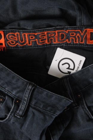 Pánske džínsy  Superdry, Veľkosť M, Farba Sivá, Cena  20,41 €