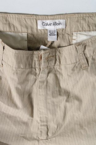 Pánské kalhoty  Calvin Klein, Velikost L, Barva Béžová, Cena  129,00 Kč