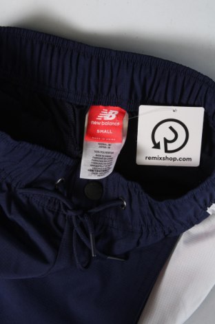 Pánské kalhoty  New Balance, Velikost S, Barva Modrá, Cena  594,00 Kč