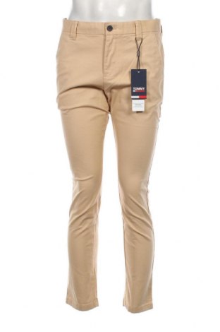 Мъжки панталон Tommy Jeans, Размер M, Цвят Бежов, Цена 80,85 лв.