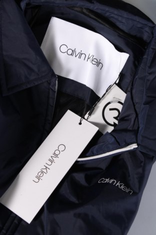 Ανδρικό μπουφάν Calvin Klein, Μέγεθος L, Χρώμα Μπλέ, Τιμή 119,61 €