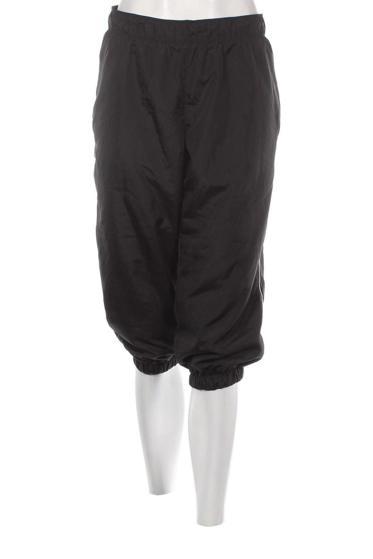 Γυναικείο αθλητικό παντελόνι Crane, Μέγεθος XL, Χρώμα Μαύρο, Τιμή 17,94 €