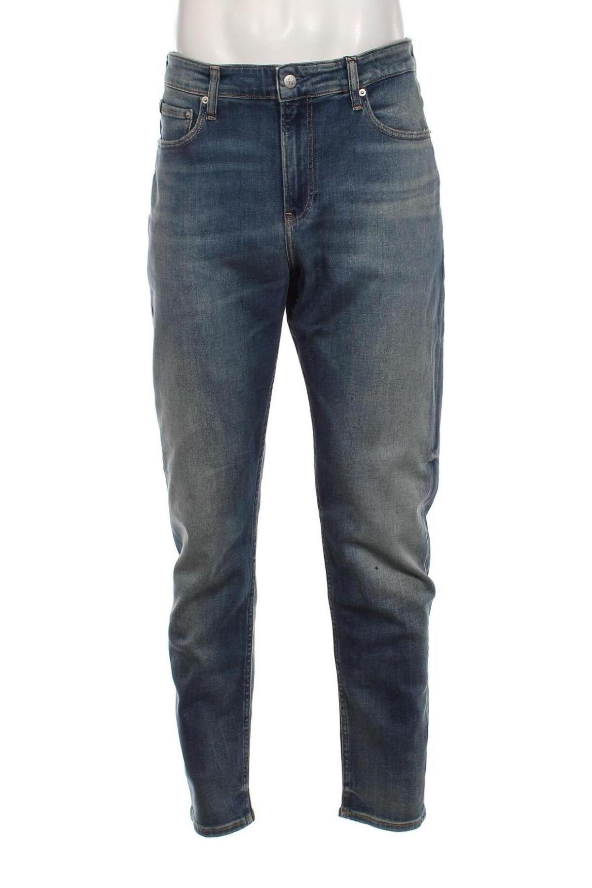 Męskie jeansy Calvin Klein Jeans, Rozmiar XL, Kolor Niebieski, Cena 215,07 zł