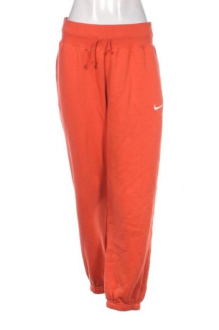 Дамско спортно долнище Nike, Размер M, Цвят Оранжев, 80% памук, 20% полиестер, Цена 146,00 лв.