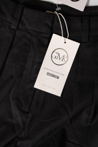 Γυναικείο παντελόνι Guido Maria Kretschmer for About You, Μέγεθος M, Χρώμα Μαύρο, Τιμή 44,85 €