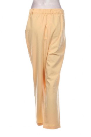 Γυναικείο παντελόνι Guido Maria Kretschmer for About You, Μέγεθος L, Χρώμα Κίτρινο, Τιμή 6,73 €
