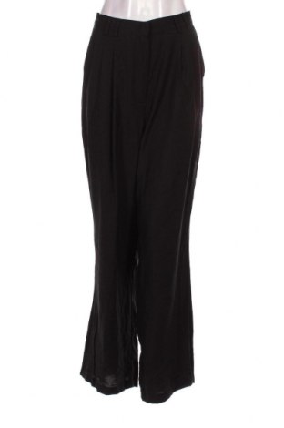 Γυναικείο παντελόνι Guido Maria Kretschmer for About You, Μέγεθος XL, Χρώμα Μαύρο, Τιμή 10,32 €