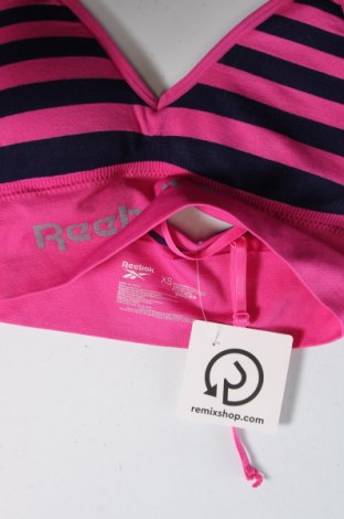 Γυναίκειο αθλητικό τοπ Reebok, Μέγεθος XS, Χρώμα Ρόζ , Τιμή 8,16 €