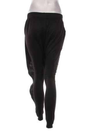 Γυναικείο αθλητικό παντελόνι, Μέγεθος L, Χρώμα Μαύρο, Τιμή 6,82 €