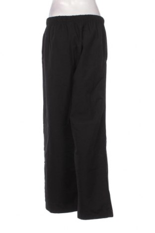 Γυναικείο αθλητικό παντελόνι Crane, Μέγεθος L, Χρώμα Μαύρο, Τιμή 5,56 €