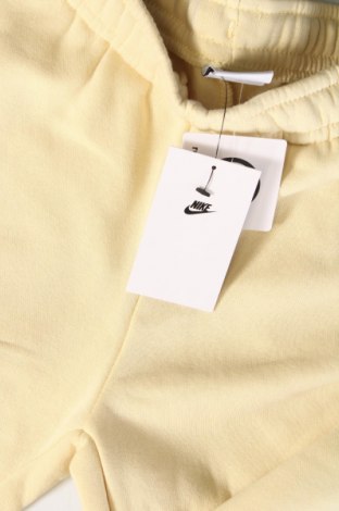 Γυναικείο αθλητικό παντελόνι Nike, Μέγεθος S, Χρώμα Κίτρινο, Τιμή 44,85 €
