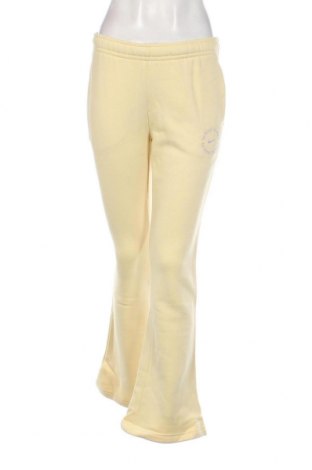 Γυναικείο αθλητικό παντελόνι Nike, Μέγεθος S, Χρώμα Κίτρινο, Τιμή 15,25 €