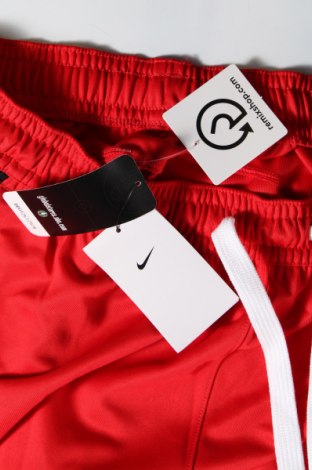Дамско спортно долнище Nike, Размер L, Цвят Червен, Цена 35,67 лв.