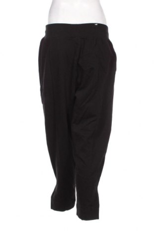 Γυναικείο αθλητικό παντελόνι PUMA, Μέγεθος M, Χρώμα Μαύρο, Τιμή 34,09 €