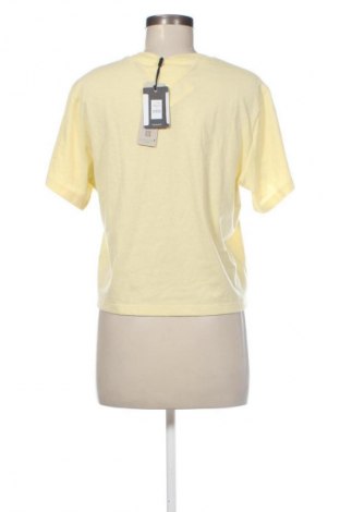 Női póló Tommy Jeans, Méret M, Szín Sárga, Ár 18 219 Ft