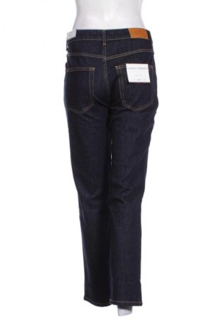 Damskie jeansy Tommy Hilfiger, Rozmiar M, Kolor Niebieski, Cena 459,99 zł