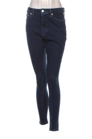 Dámske džínsy  Tommy Jeans, Veľkosť M, Farba Modrá, Cena  59,95 €
