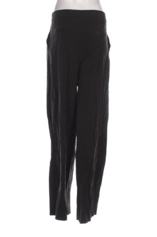 Dámske nohavice Guido Maria Kretschmer for About You, Veľkosť M, Farba Čierna, Cena  18,95 €