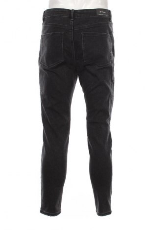 Męskie jeansy Stradivarius, Rozmiar L, Kolor Czarny, Cena 63,99 zł