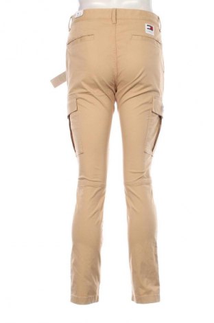 Męskie spodnie Tommy Jeans, Rozmiar M, Kolor Beżowy, Cena 210,99 zł