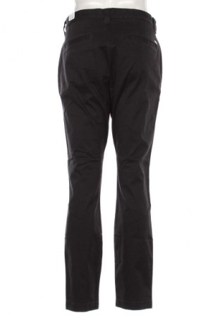 Pánske nohavice  Tommy Jeans, Veľkosť L, Farba Čierna, Cena  33,95 €