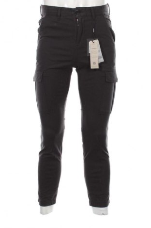Męskie spodnie Tommy Jeans, Rozmiar S, Kolor Niebieski, Cena 599,99 zł