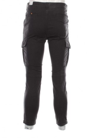 Męskie spodnie Tommy Jeans, Rozmiar S, Kolor Niebieski, Cena 599,99 zł