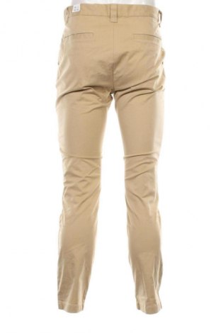 Pantaloni de bărbați Tommy Jeans, Mărime M, Culoare Bej, Preț 119,99 Lei