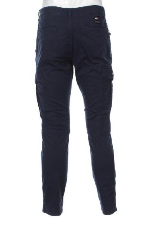 Męskie spodnie Tommy Jeans, Rozmiar M, Kolor Niebieski, Cena 599,99 zł
