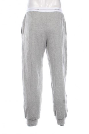 Pánské tepláky  Calvin Klein, Velikost M, Barva Šedá, Cena  1 229,00 Kč