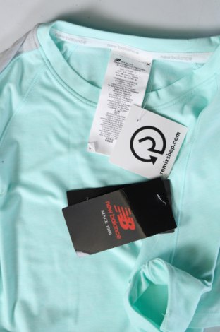 Γυναικείο t-shirt New Balance, Μέγεθος S, Χρώμα Πράσινο, Τιμή 29,90 €