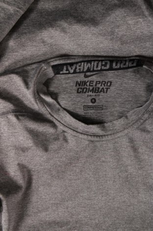 Γυναικείο t-shirt Nike, Μέγεθος S, Χρώμα Γκρί, Τιμή 12,37 €