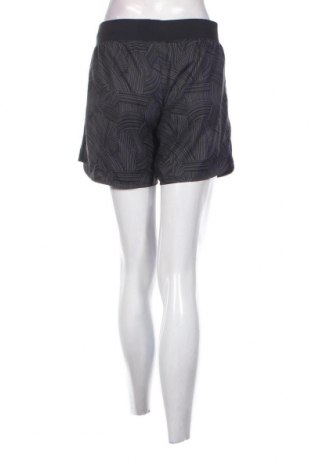 Γυναικείο κοντό παντελόνι ASICS, Μέγεθος M, Χρώμα Πολύχρωμο, Τιμή 14,85 €