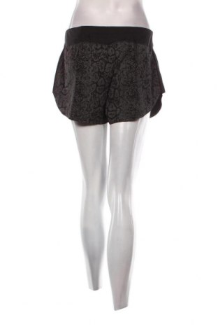 Γυναικείο κοντό παντελόνι PUMA, Μέγεθος S, Χρώμα Μαύρο, Τιμή 12,51 €