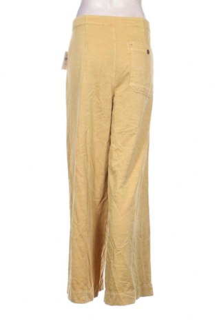 Damskie spodnie Urban Outfitters, Rozmiar XL, Kolor Żółty, Cena 231,89 zł