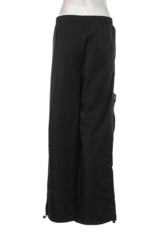 Γυναικείο αθλητικό παντελόνι, Μέγεθος XL, Χρώμα Μαύρο, Τιμή 4,84 €