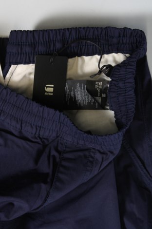 Męskie spodnie G-Star Raw, Rozmiar XS, Kolor Niebieski, Cena 474,45 zł