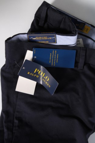 Męskie spodnie Polo By Ralph Lauren, Rozmiar L, Kolor Niebieski, Cena 451,95 zł
