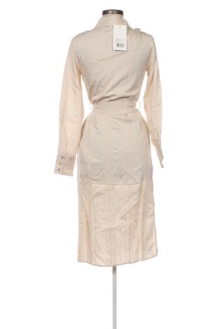 Kleid Guido Maria Kretschmer for About You, Größe XS, Farbe Beige, Preis 52,58 €