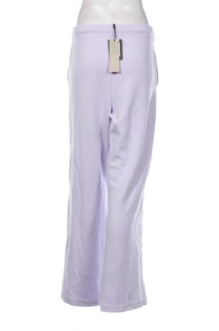 Dámske tepláky Tommy Jeans, Veľkosť M, Farba Fialová, Cena  90,95 €