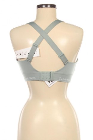 Damski sportowy top Calvin Klein, Rozmiar M, Kolor Zielony, Cena 252,99 zł