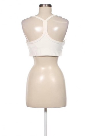 Női sport top H&M, Méret L, Szín Ekrü
, Ár 3 000 Ft