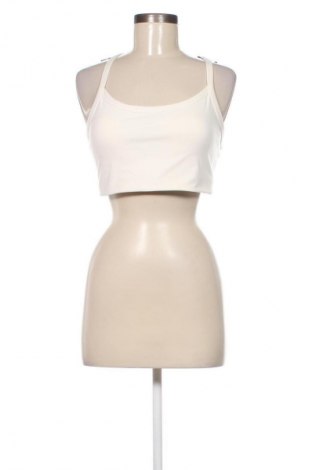 Női sport top H&M, Méret L, Szín Ekrü
, Ár 3 000 Ft