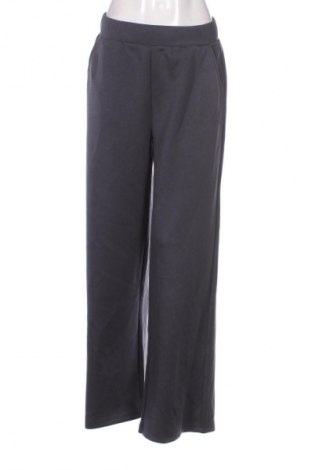 Damskie spodnie sportowe Calvin Klein Jeans, Rozmiar M, Kolor Niebieski, Cena 267,99 zł