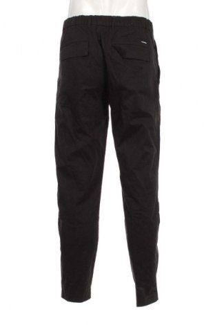 Pánske nohavice  Calvin Klein, Veľkosť M, Farba Čierna, Cena  88,95 €