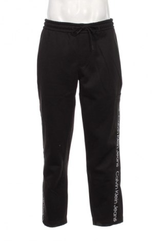 Pánské tepláky  Calvin Klein Jeans, Velikost L, Barva Černá, Cena  1 899,00 Kč