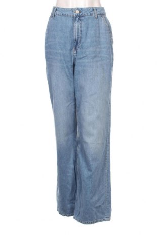 Damen Jeans Guido Maria Kretschmer for About You, Größe L, Farbe Blau, Preis € 11,37