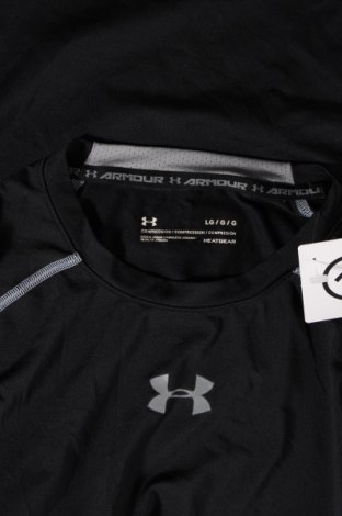 Γυναικείο t-shirt Under Armour, Μέγεθος L, Χρώμα Μαύρο, Τιμή 12,37 €