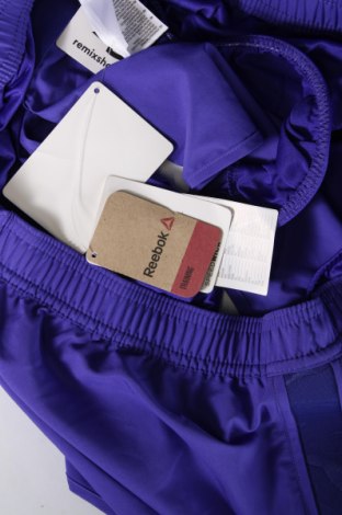Γυναικείο κοντό παντελόνι Reebok, Μέγεθος XL, Χρώμα Βιολετί, Τιμή 23,24 €