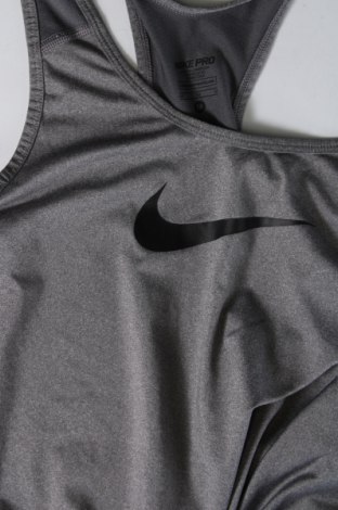 Γυναίκειο αθλητικό τοπ Nike, Μέγεθος M, Χρώμα Γκρί, Τιμή 12,28 €